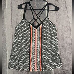 Black and White Patterned Top with Orange Accents